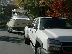 Cabin boat and tow vehicle